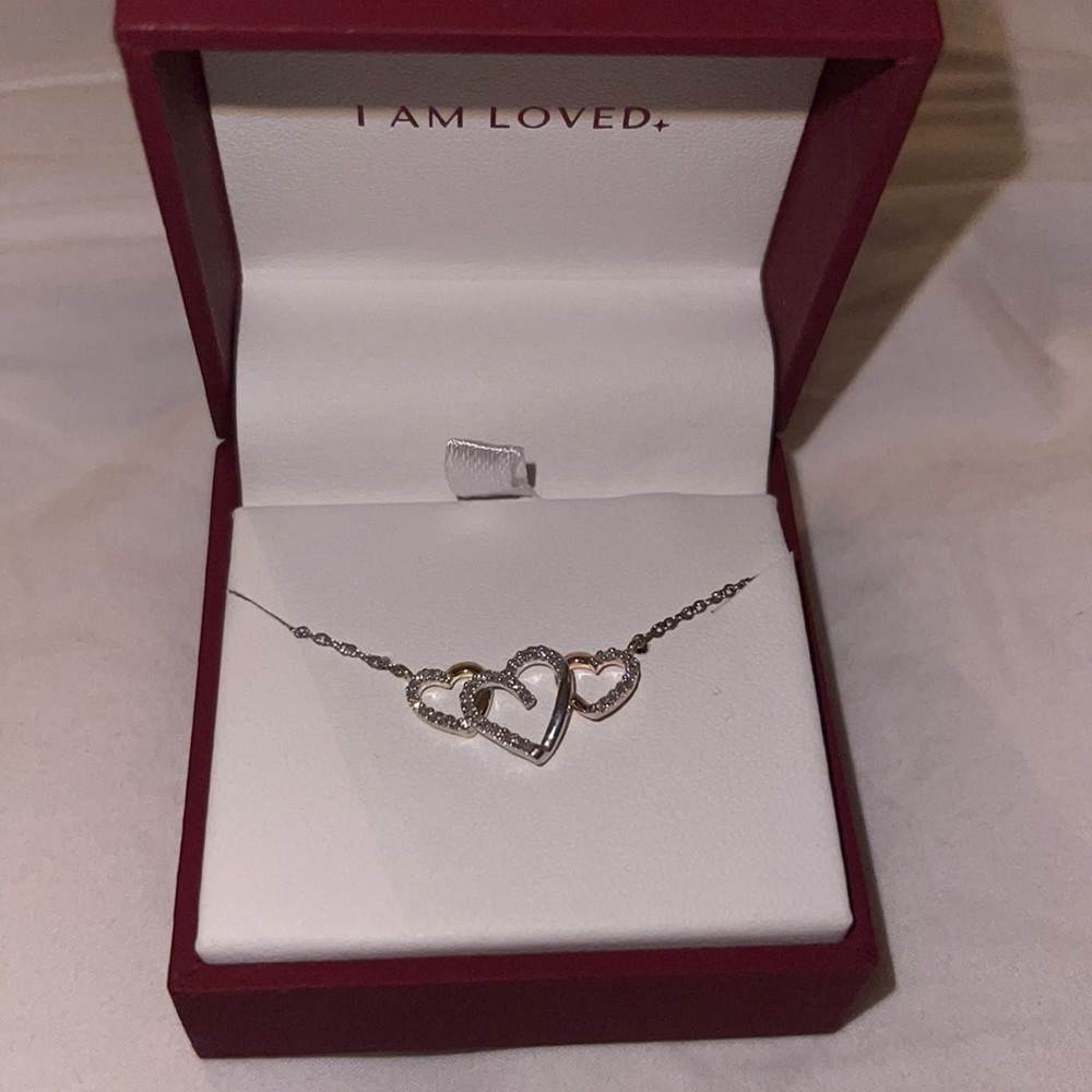 Never taken out of the box brand new Helzberg Diamonds necklace!!